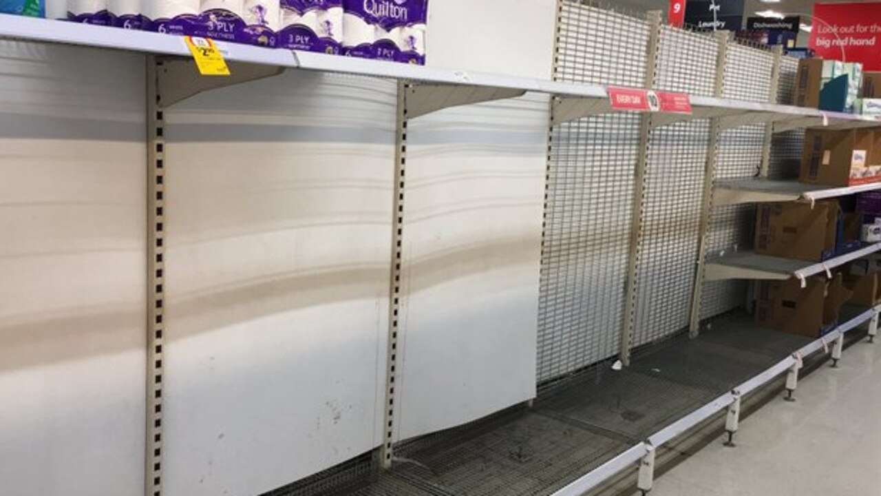 Empty shelves at a North Sydney supermarket where toilet paper, water, food staples and hand sanitiser disappeared.