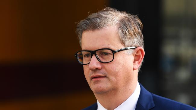 National Australia Bank Chief Customer Officer Andrew Hagger leaves the Federal Court, in Melbourne, Monday, August 13, 2018. The $2.6 trillion superannuation industry will be taken to task by a royal commission over whether funds act in the best interests of Australians when managing their retirement savings. Australia's largest super funds head a long list of players called before a two-week financial services royal commission hearing that began in Melbourne on Monday. (AAP Image/James Ross) NO ARCHIVING