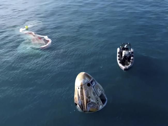 The SpaceX capsule floats off the coast of Tallahassee, Florida. Picture: NASA via AP