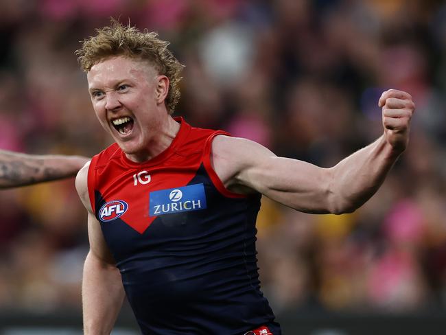 MELBOURNE, AUSTRALIA - August 20, 2023. AFL .  Clayton Oliver of the Demons celebrates a 4th quarter goal during the round 23 match between Melbourne and Hawthorn the MCG in Melbourne, Australia.  Photo by Michael Klein.