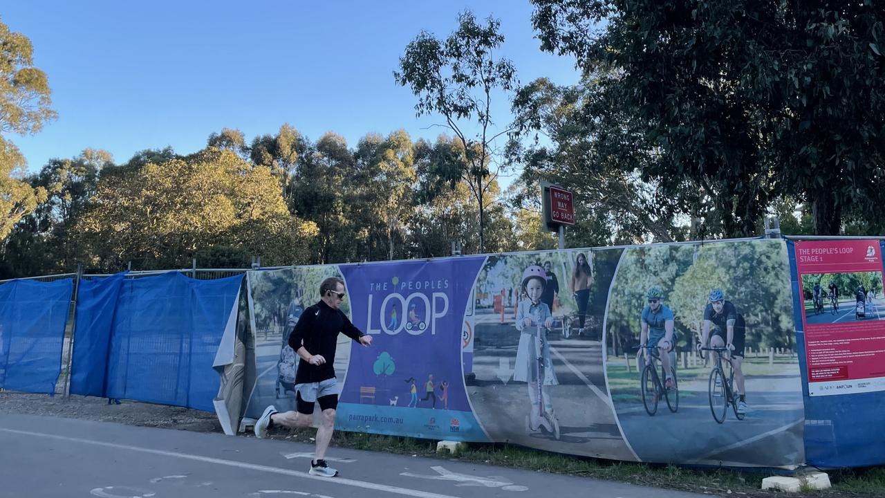 Peter Wykes jogs through Parramatta Park, near the under-construction car park which will be metered.