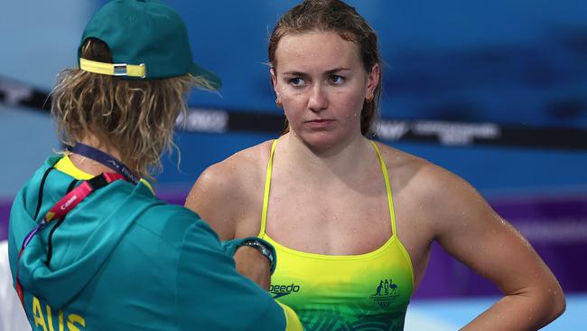 Australian swimmer Ariarne Titmus talks with coach Dean Boxall in Birmingham. Photo by Michael Klein.