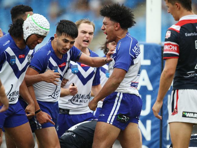 First Round match of the SG Ball competition between Roosters and Bulldogs at Belmore Oval today with Bulldogs winning 26-16. Pictured is Bulldog's Paul Alamoti (centre of frame) who scored 2 tries in the match. Picture: David Swift.