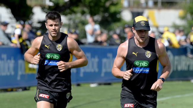 Trent Cotchin and Jacob Hopper at Richmond training at Punt Road Oval. Picture: Andrew Henshaw