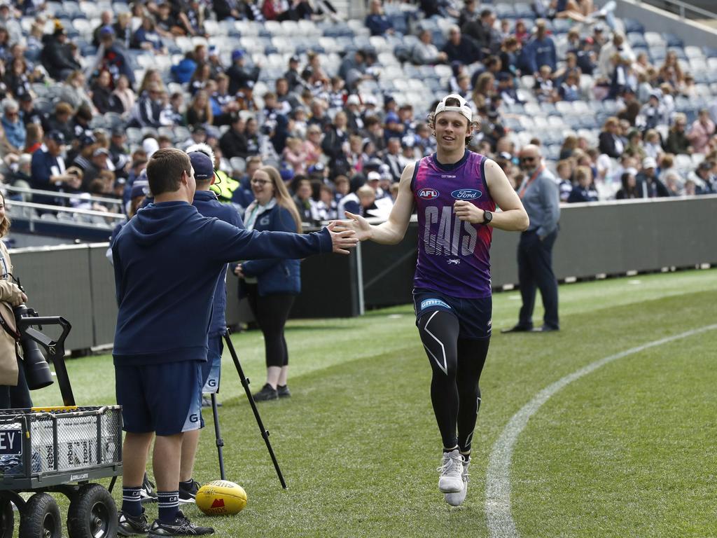 GEELONG, AUSTRALIA - SEPTEMBER 19: Max Holmes of the Cats runs laps during a Geelong Cats AFL training session at GMHBA Stadium on September 19, 2022 in Geelong, Australia. (Photo by Darrian Traynor/Getty Images)