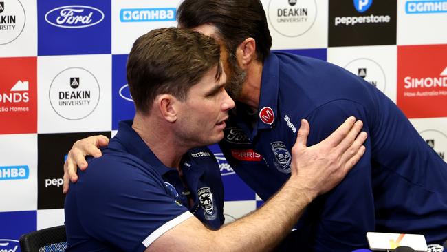 GEELONG, AUSTRALIA - AUGUST 06: Tom Hawkins and Chris Scott, Senior Coach of the Cats hug during a media opportunity at GMHBA Stadium on August 06, 2024 in Geelong, Australia. (Photo by Josh Chadwick/Getty Images)