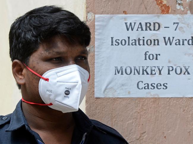 A security guard at the entrance of an isolation ward for monkeypox patients at a government hospital in Hyderabad. India has reported its first fatality in a 22-year-old man. Picture: AFP