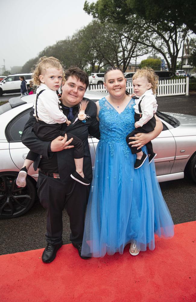 Graduates Corey Butler and Mishaylla Whitehead, with Mishaylla's nephews Alex (left) and Isaac, at Clifford Park Special School formal at Clifford Park Racecourse, Wednesday, November 20, 2024. Picture: Kevin Farmer