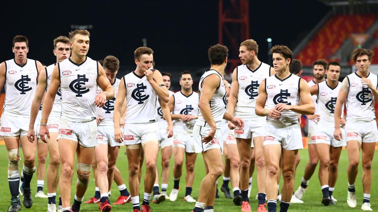 Carlton players leave the field after Sunday’s loss. Picture: Getty Images