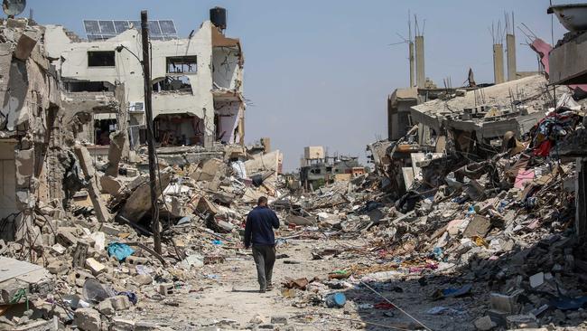 People inspect damage following Israeli airstrikes in Khan Yunis, Gaza. Picture: Getty