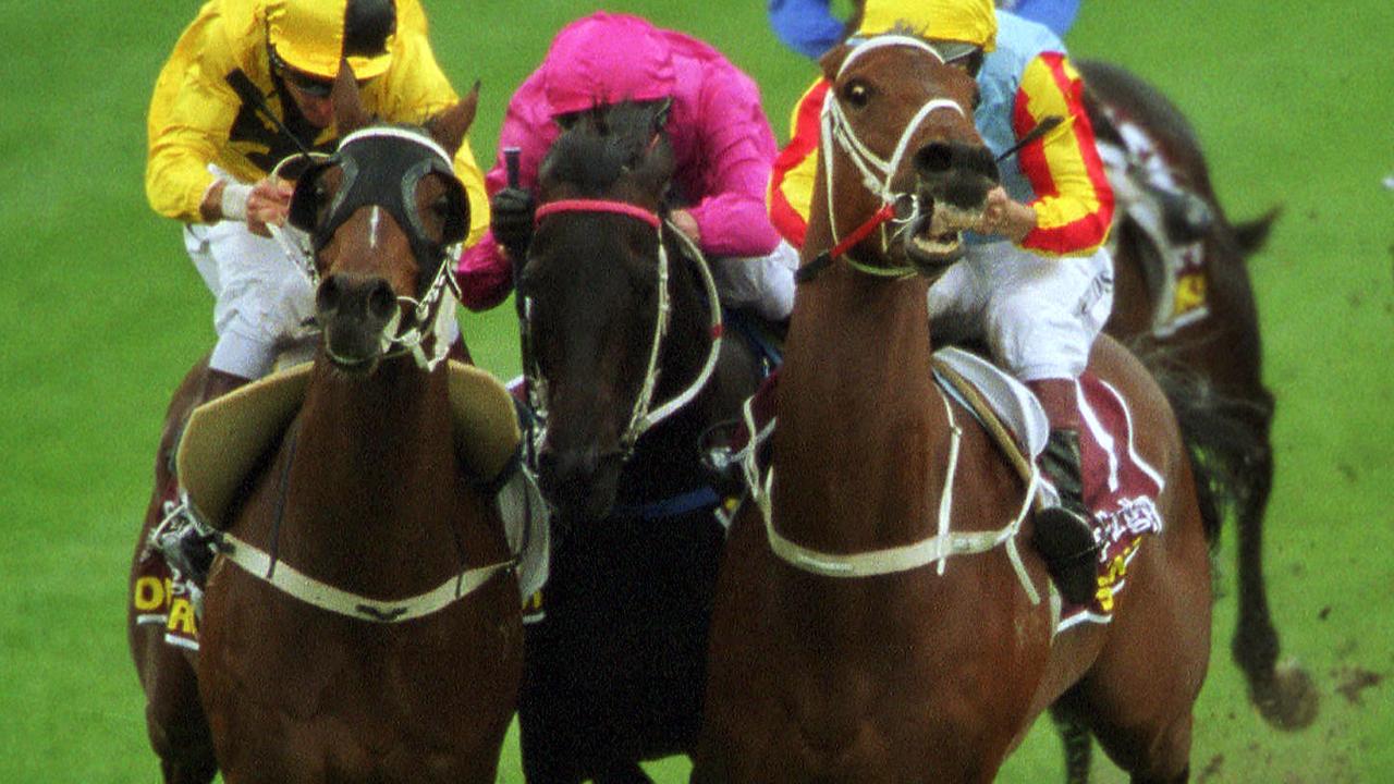 Horseracing - Racehorse Viscount (c) squeezed between Northerly (l) and Sunline (r) during Cox Plate race at Moonee Valley 27 Oct 2001.  a/ct