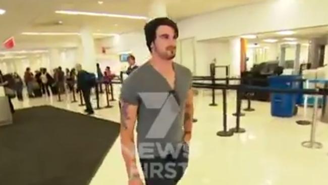 Scott Broadbridge arrives at LA airport yesterday after leaving Colombia. Image: Channel 7.