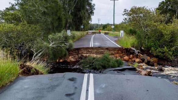 Flooding has washed away Foreshore Dr, Corlette Picture: Facebook/Stephen Keating.