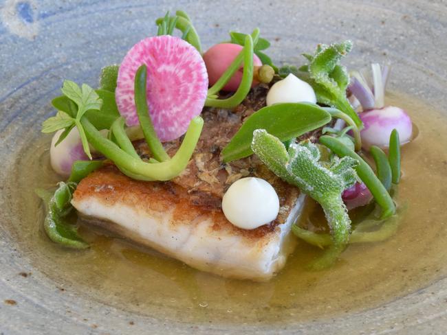 The barramundi and sea herbs dish. Picture: Jenifer Jagielski