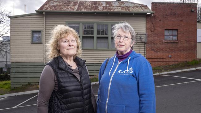 Susan Heywood-Downard (left) and Marian Mattar in front of the former Belgrave Grammar School. Picture: Daniel Pockett