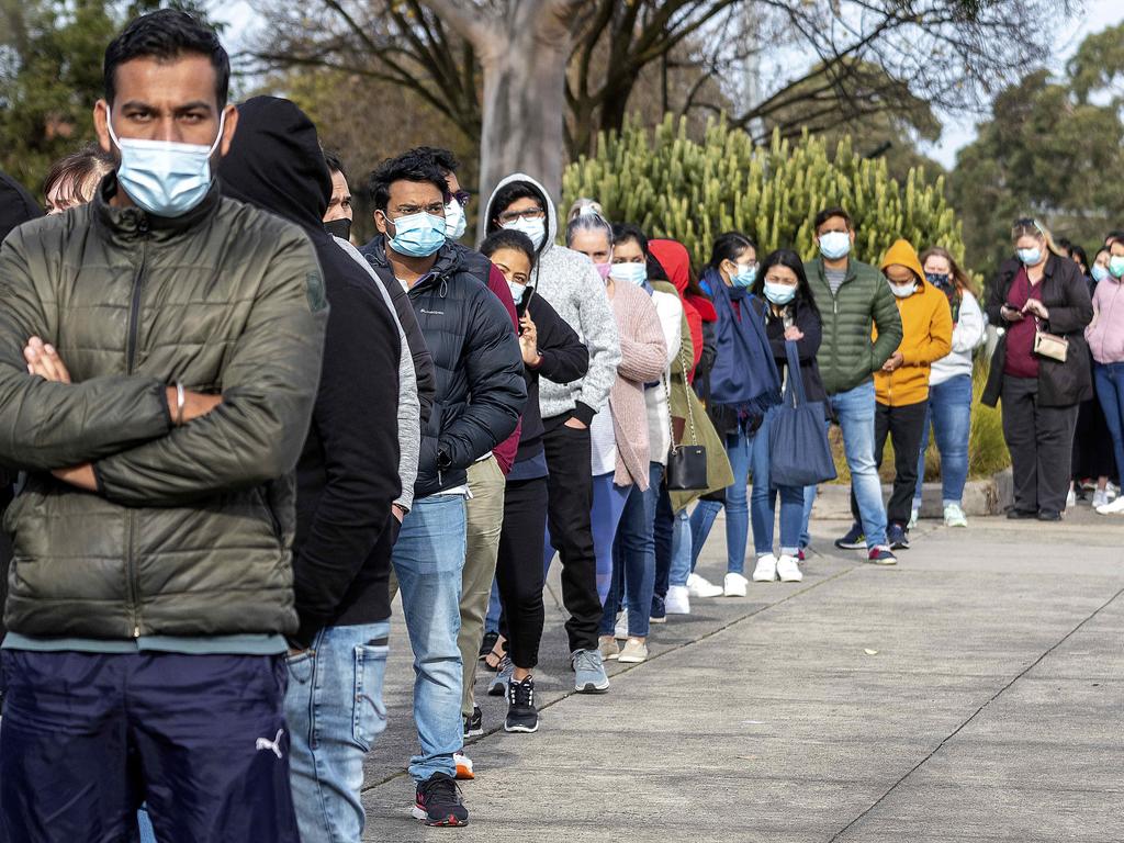 People queue for Covid vaccinations in Melbourne. Picture: NCA NewsWire/David Geraghty