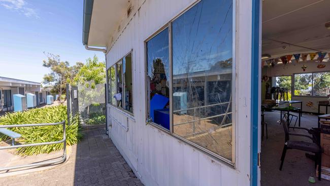 Dozens of windows were broken at Happy Valley Primary School by golf balls. Picture: Ben Clark