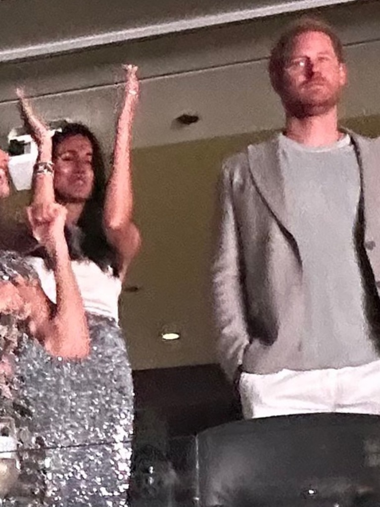 An unimpressed-looking Prince Harry and Meghan Markle at Beyonce’s concert. Picture: Twitter