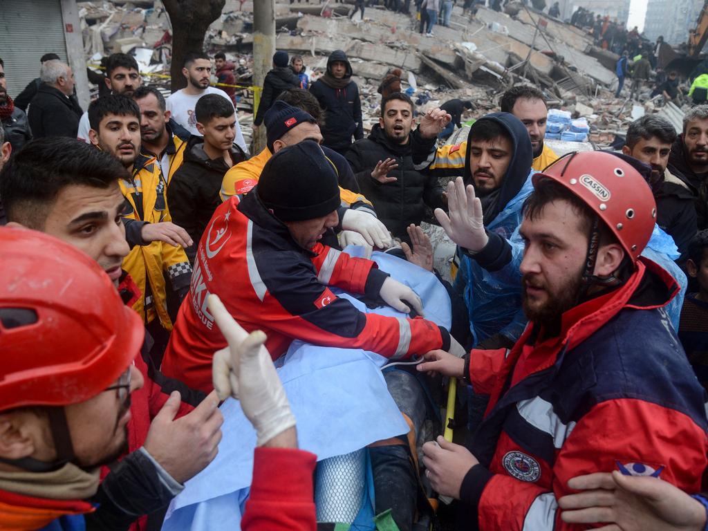 Rescue workers and volunteers pull out a survivor from the rubble in Diyarbakir, Turkey. Picture: AFP