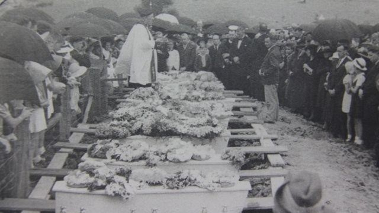 Nine of the cub scouts' caskets awaiting burial at South Grafton Cemetery after the drowning tragedy in the Clarence River in the ‘40s.