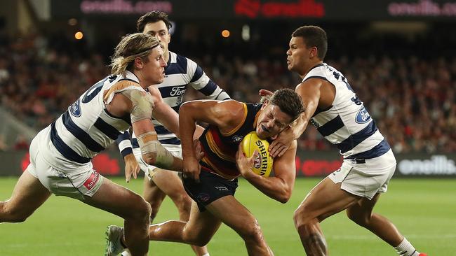 Mark Blicavs and Brandan Parfitt led the way for the Cats on the defensive end. Picture: Sarah Reed/AFL Photos via Getty Images