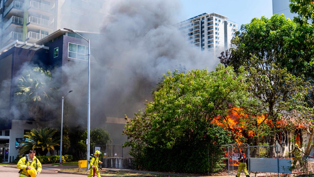 A fire has totally destroyed a house right next to DarwinÃ&#149;s tallest high-rise building, with the full range of emergency services rushing to the scene of the ferocious blaze. The fire on McMinn St is under investigation. picture: Che Chorley