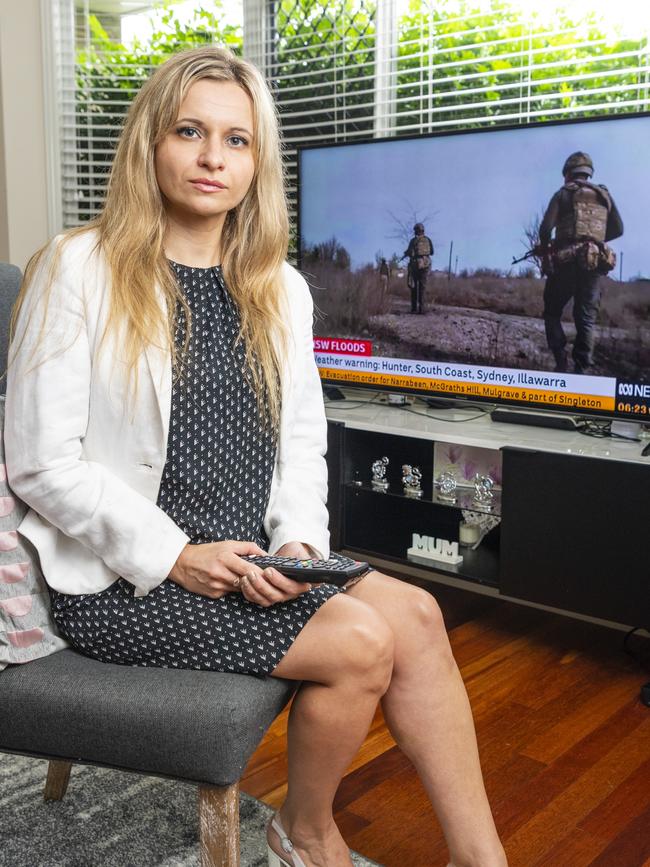 Toowoomba woman Oksana Shevchenko watches the news to get information about Ukraine with family members still living in the war-torn country, Wednesday, March 9, 2022. Picture: Kevin Farmer