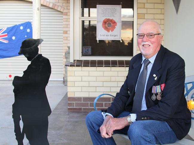 Ceduna local nd Vietnam veteran Cliff Thomas observing Anzac Day in the driveway at friend Jimmy Spry’s house. Picture: Andrew brooks