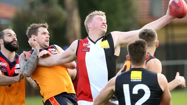 West Coburg’s Daniel Archer takes possession. Picture: Hamish Blair