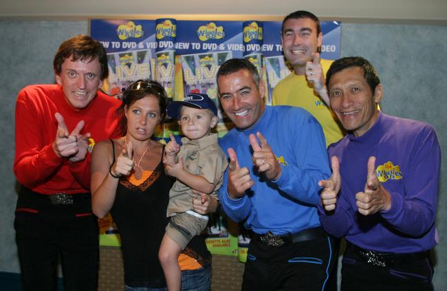 Chambers in 2005 with her then two-year-old son Talon, with Australia’s most famous musicians. Picture: Dan Peled