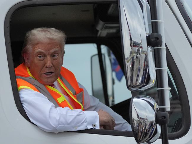 Republican presidential nominee, former President Donald Trump, sits in a garbage truck. Picture: AP Photo/Julia Demaree Nikhinson