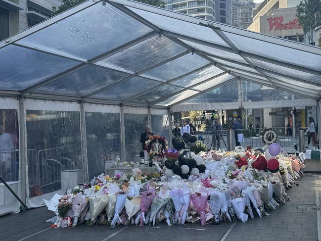 A marquee was erected over the Bondi floral tributes on Wednesday, as rain is expected later in the day.