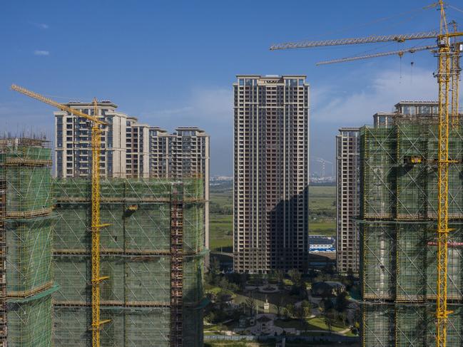 High-rise apartment buildings at China Evergrande Group's under-construction Riverside Palace development in Taicang, Jiangsu province, China, on Friday, Sept. 24, 2021. China's housing regulator has stepped up oversight of China Evergrande Group's bank accounts to ensure funds are used to complete housing projects and not diverted to pay creditors. Photographer: Qilai Shen/Bloomberg via Getty Images