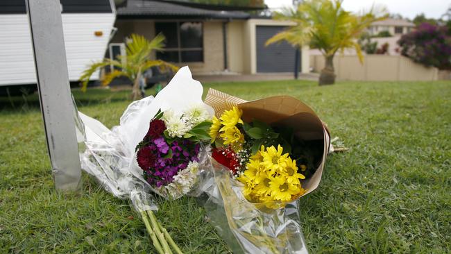 Floral tributes outside the home where Kelly Wilkinson was murdered. Picture: Tertius Pickard