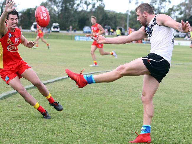 Round 11 NEAFL game between the Southport Sharks and Gold Coast Suns at Fankhauser Reserve. Photo of Brodie Murdoch (Sharks) and Ashton Crossley. Photo by Richard Gosling