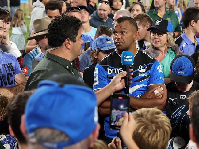 Kurtley Beale surrounded by Western Force supporters after playing the Waratahs in May. Picture: Paul Kane/Getty Images