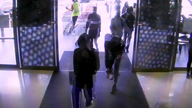 Police have released CCTV footage after a distraction-style robbery at a Casula phone store on April 12.