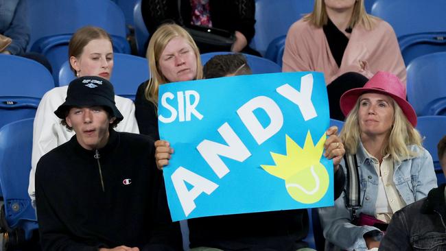 Tired fans display a Sir Andy sign as they watch Andy Murray take on Thanasi Kokkinakis. (Photo by Clive Brunskill/Getty Images)