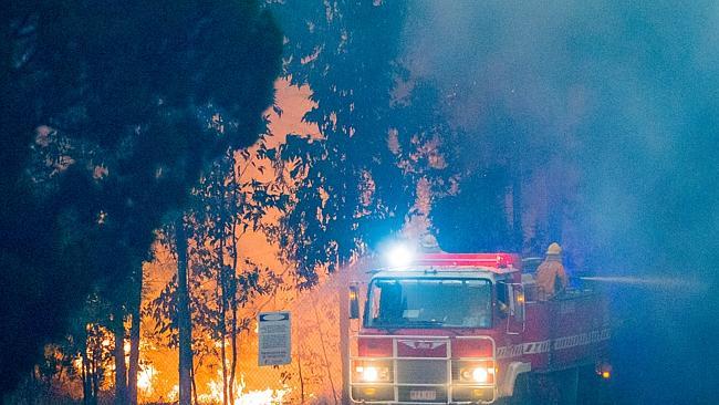 Fire crews use the remaining light of the day to tackle the industrial estate blaze.