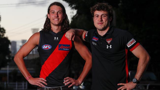 Essendon recruit Archie Perkins with new teammate Andy McGrath.