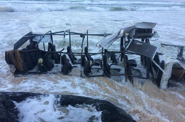 MOTHER nature has slowly but surely unleashed its fury on a tourist bus stranded in the sea at Fraser Island overnight. Image via Rainbow Recovery, Repairs and Services and Sailfish on Fraser.