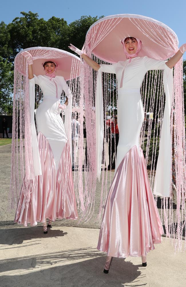 Stilt walkers at Fashions on the Field. Picture: David Caird