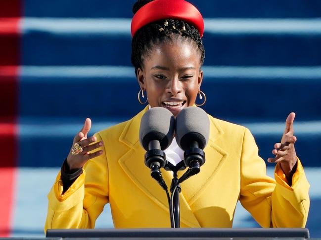 American poet Amanda Gorman reads a poem during the 59th Presidential Inauguration at the US Capitol in Washington DC on January 20, 2021. (Photo by Patrick Semansky / POOL / AFP)