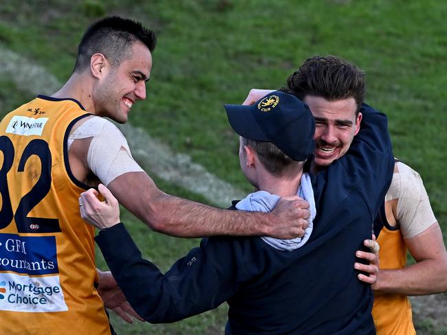 StrathmoreÃs Athan Tsialtas  ???? coach Matt Horne celebrate on the siren after winning the EDFL Premier Division grand final between Aberfeldie and Strathmore at Windy Hill Oval in Essendon, Saturday, Sept. 10, 2022. Picture: Andy Brownbill