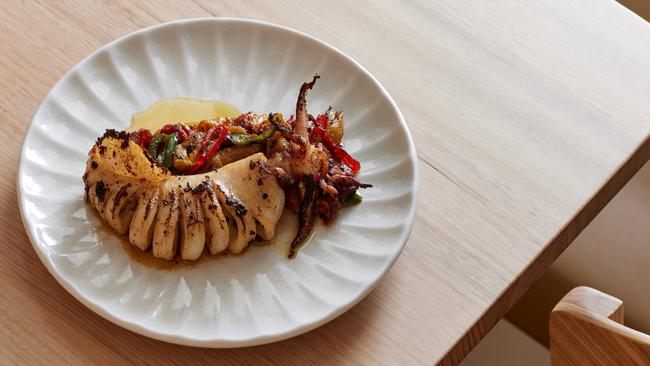 Whole grilled squid, red capsicum at Cottage Kitchen restaurant, North Adelaide . Picture: Supplied