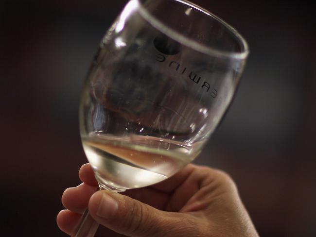 MIAMI, FL - JUNE 06: Monica De Abreu tastes a white wine as she decides which wines to purchase from a salesman at Global Liquors on June 6, 2011 in Miami, Florida. Reports indicate that for the first time, the U.S. consumed more wine than France in 2010. The French still drink far more wine per capita than Americans, but the United States, which has a much larger population, has more people pouring a glass of wine. Joe Raedle/Getty Images/AFP== FOR NEWSPAPERS, INTERNET, TELCOS & TELEVISION USE ONLY ==