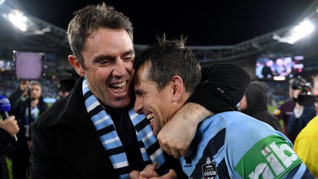 NSW Blues coach Brad Fittler celebrates with Mitchell Pearce following their win in Game 3 of the 2019 State of Origin series. Picture: AAP Image/Dan Himbrechts