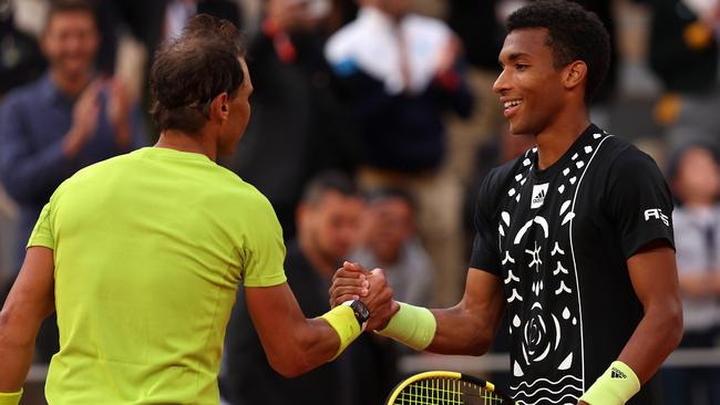 Rafael Nadal and Felix Auger-Aliassime embrace after the epic match. Picture: Getty Images