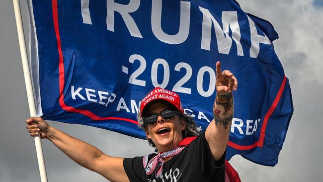 A Trump supporter outside the former president’s Mar-a-Lago resort and residence in Palm Beach, Florida, on Saturday. Picture: AFP