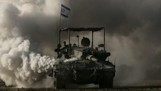 An Israeli tank moves along the Gaza border on Monday. Picture: Getty Images